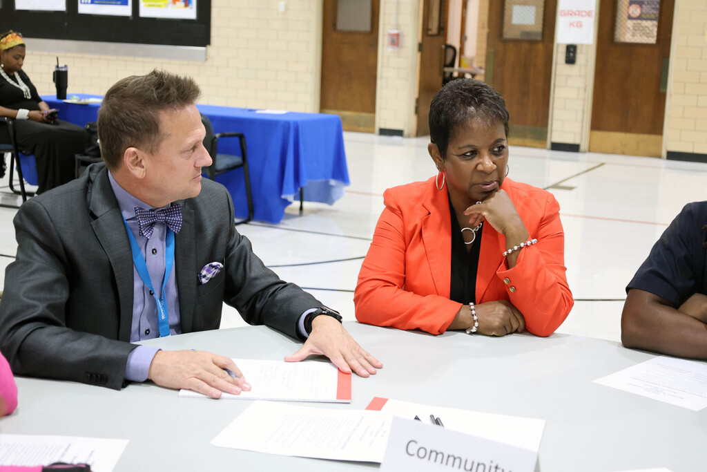 Dr. Tanya Patton and Dr. Joell Ramsdell sit at a table