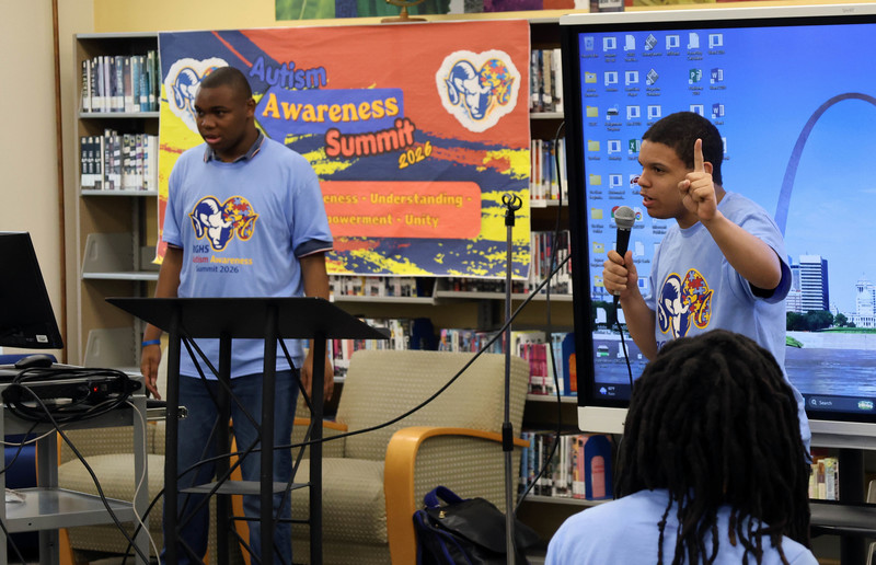 Autism Awareness Summit students talking