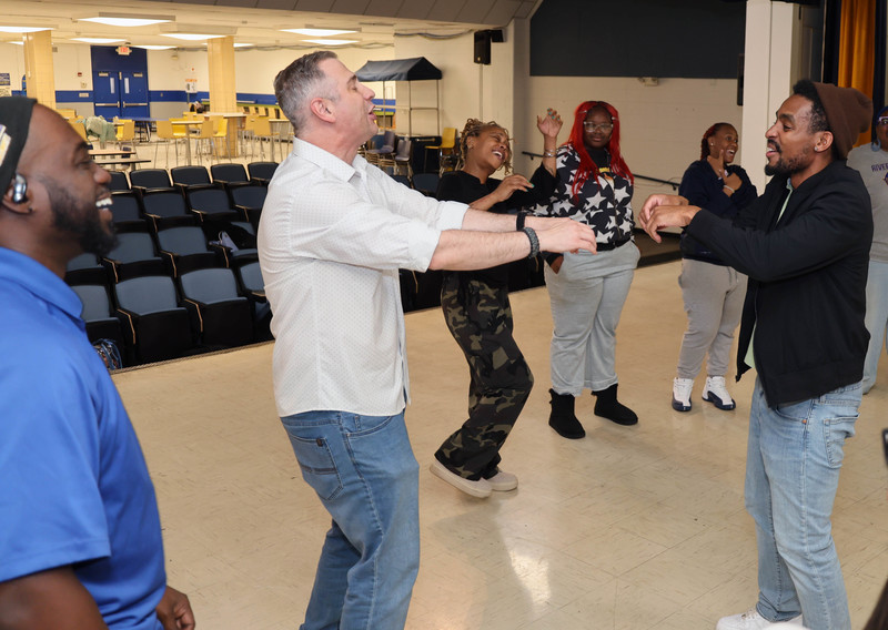 BJ Lange with RGHS staff and students during an improv activity