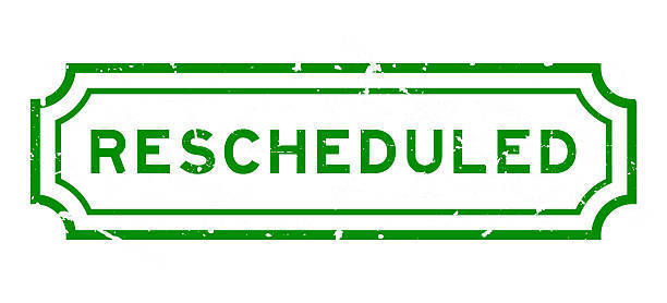 The word rescheduled in a green box