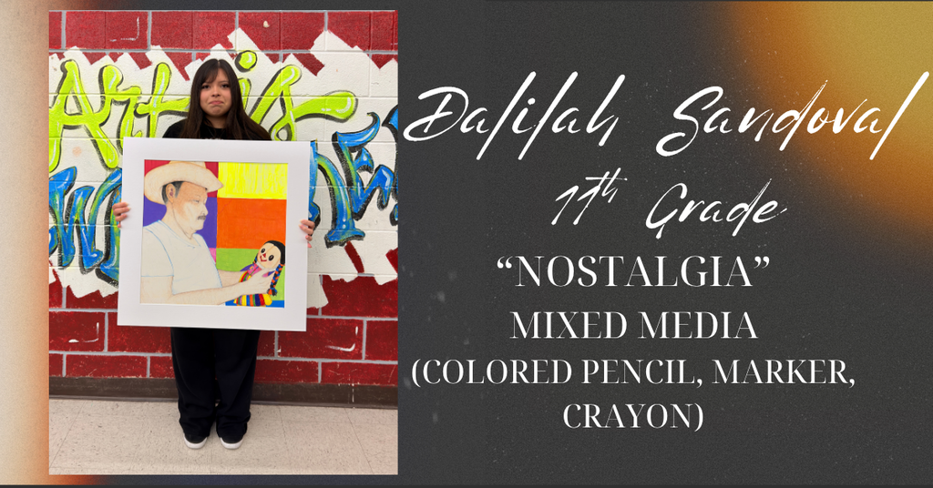 Deliliah holding up her art work. 