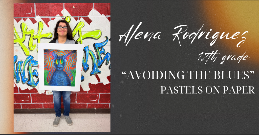 Alena holding up her artwork. 