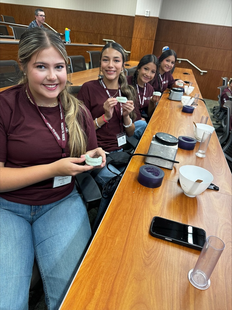 Students smiling in classroom