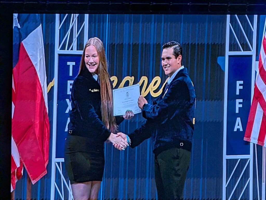 Abigail Solomon receiving her award