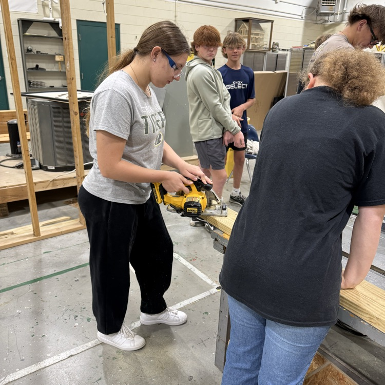 learning to use a saw