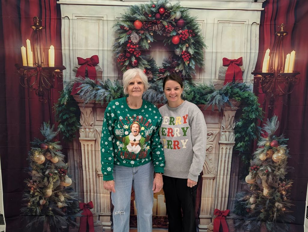 picture of women in front of backdrop