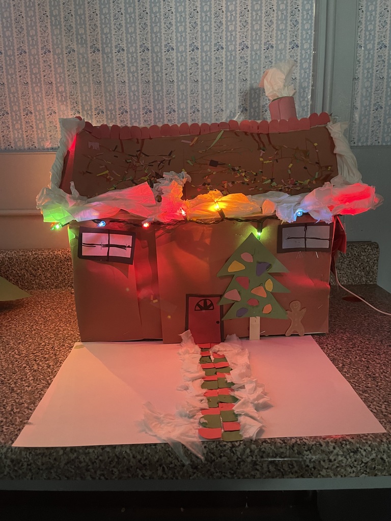 House with lights, tree, colored sidewalk