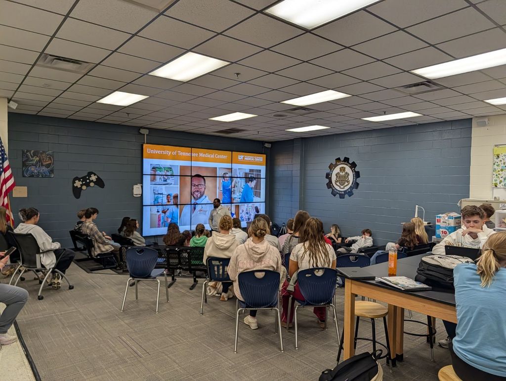 students listening to speaker