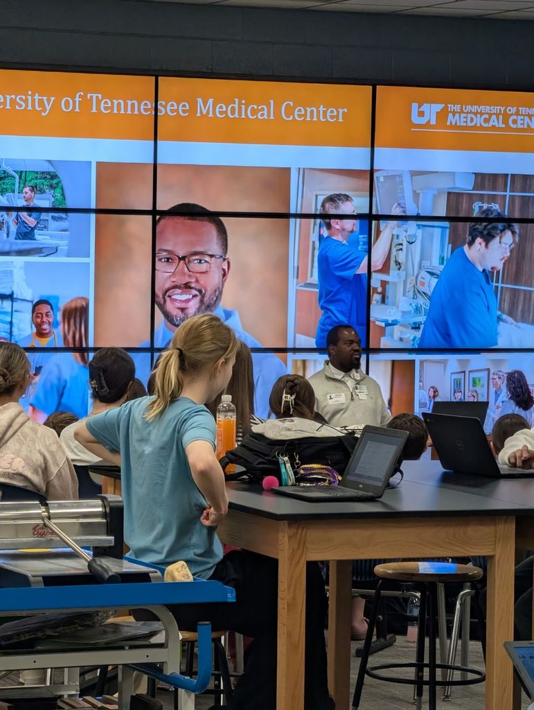 students listening to speaker