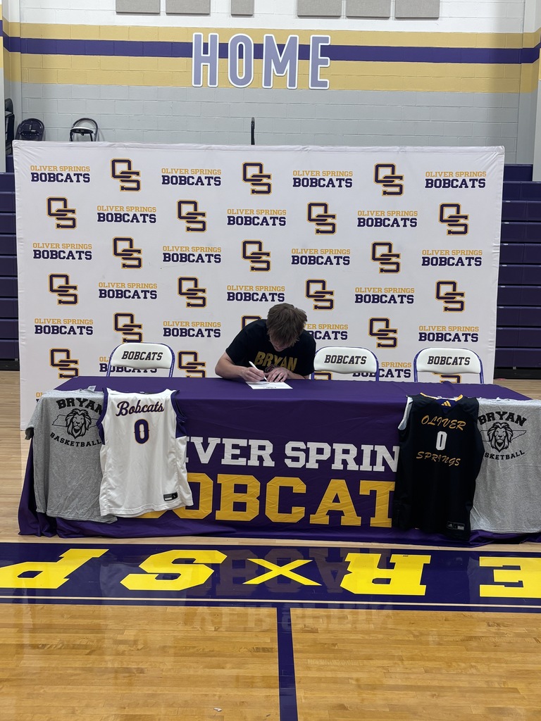 picture of Zach Hamby signing his contract