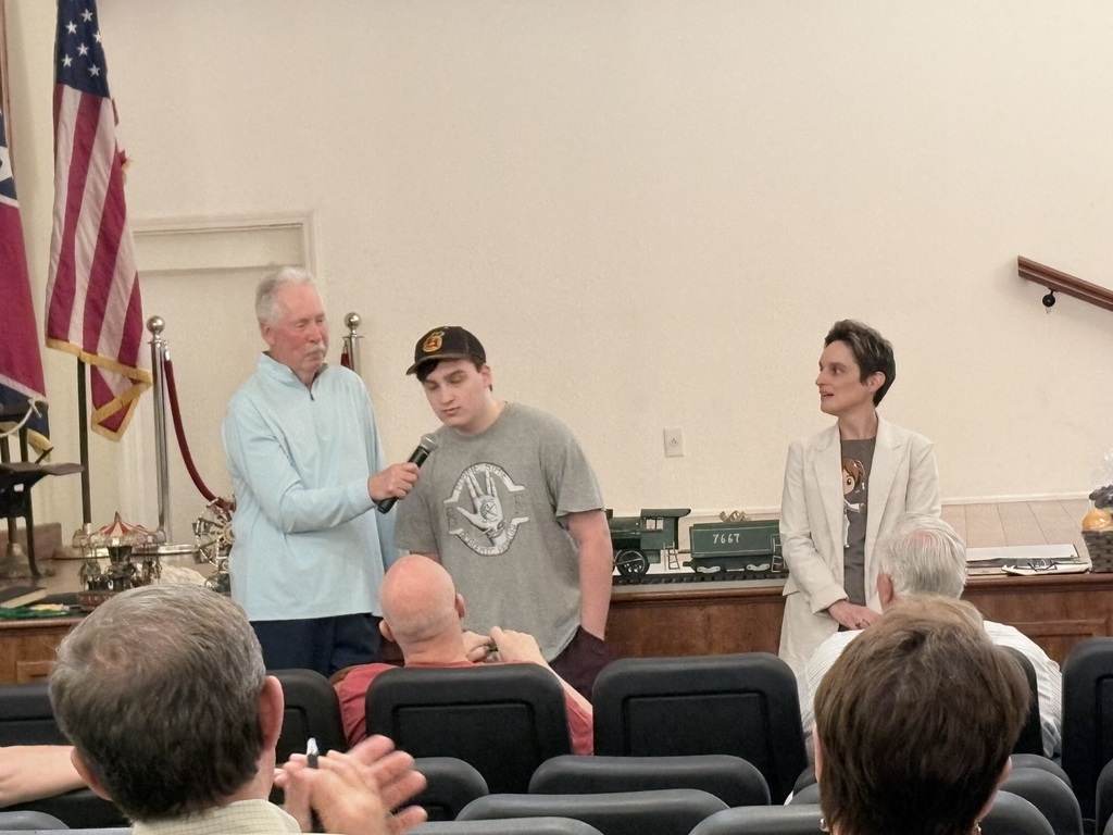 Lane talking at the meeting