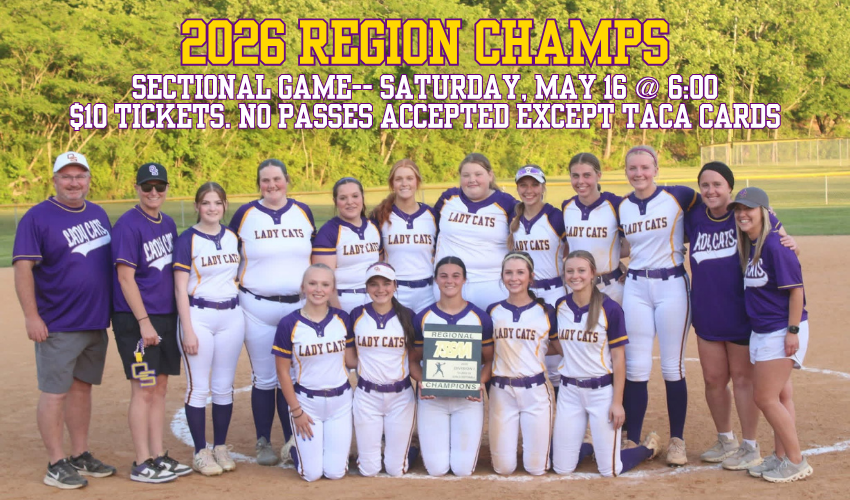 softball team with region champs plaque