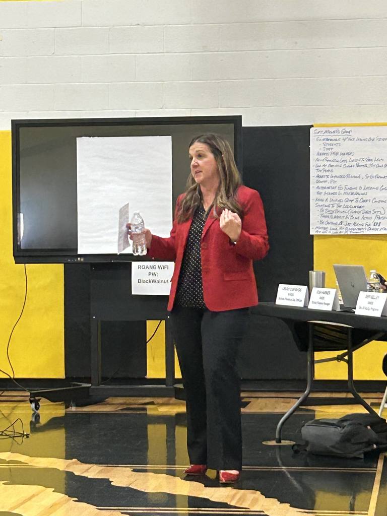 Education stakeholders conversing about the funding formula