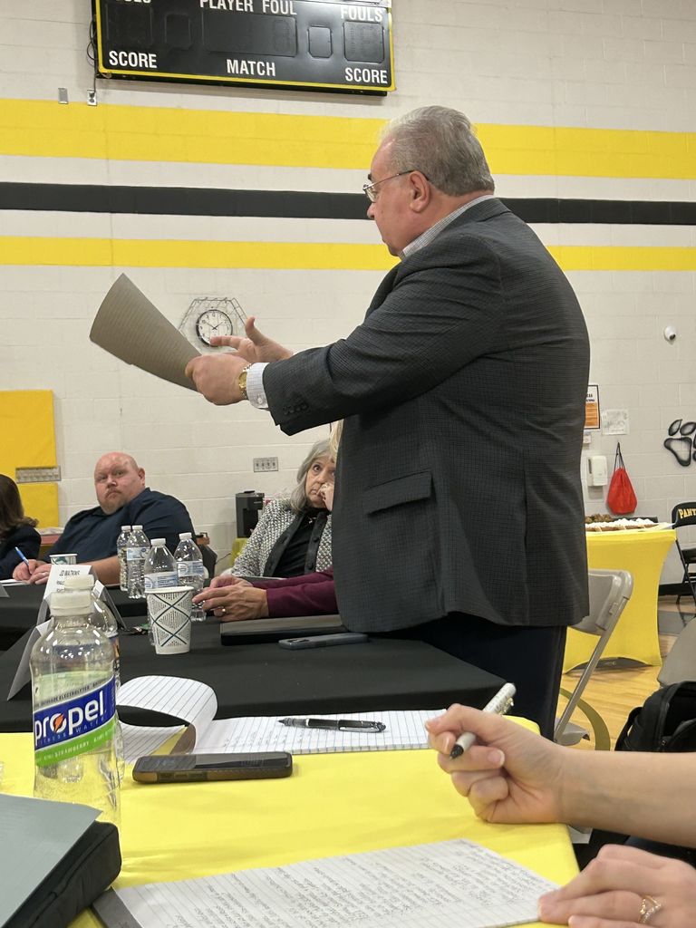 Education stakeholders conversing about the funding formula