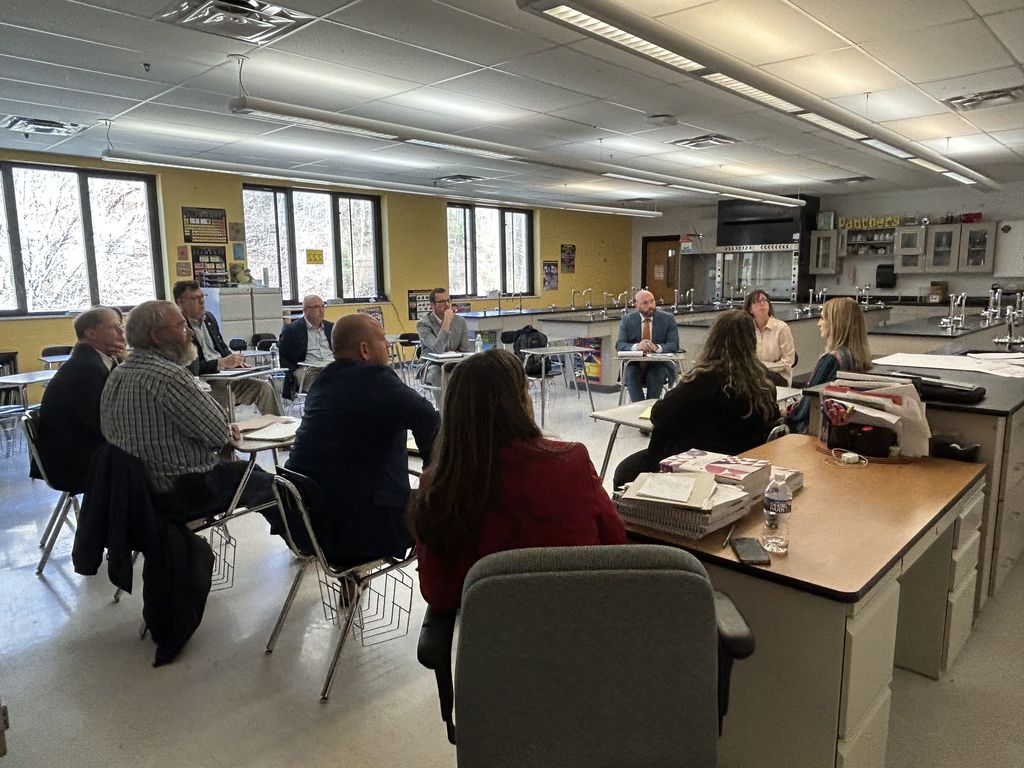 Education stakeholders conversing about the funding formula
