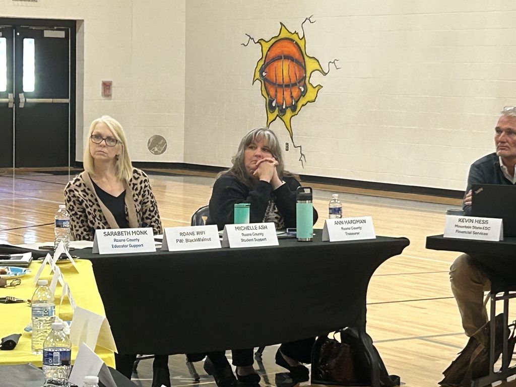 Education stakeholders conversing about the funding formula