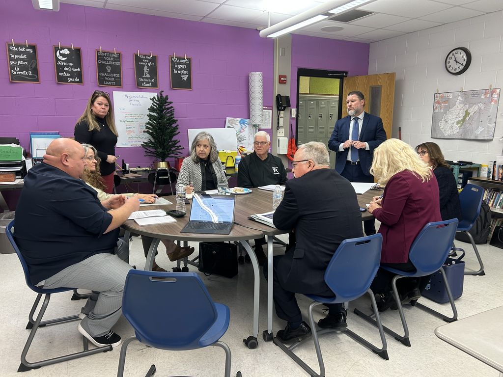 Education stakeholders conversing about the funding formula