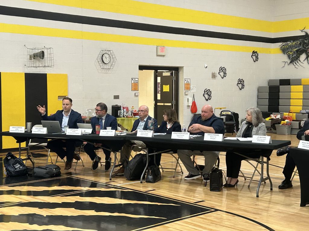 Education stakeholders conversing about the funding formula