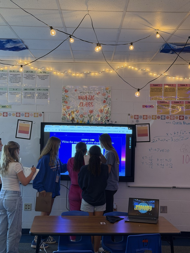 Algebra 1 is working on reviewing the first nine weeks through a fun jeopardy game!!