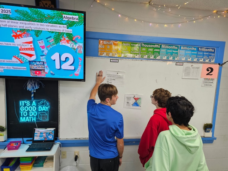 students at whiteboard