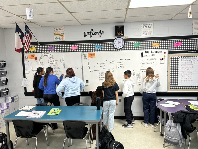 students at whiteboard