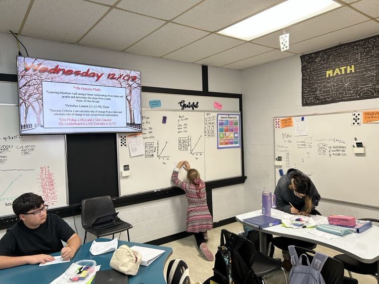 students at whiteboard