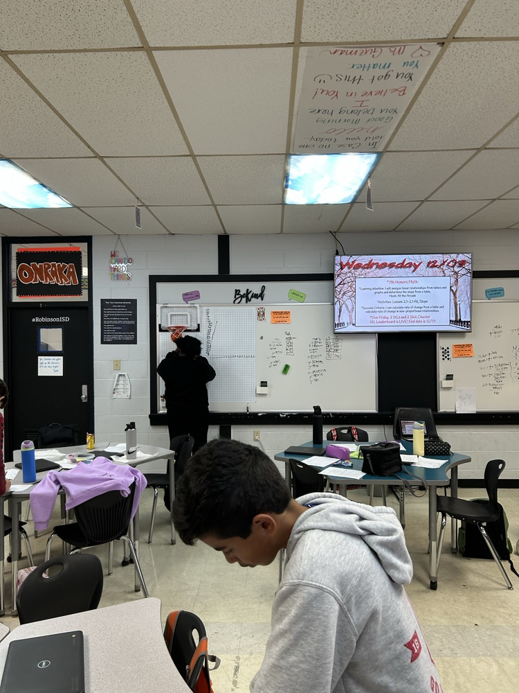 students at whiteboard