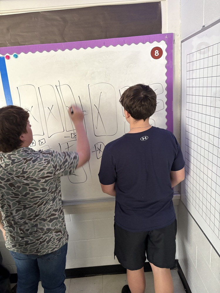 students at whiteboard