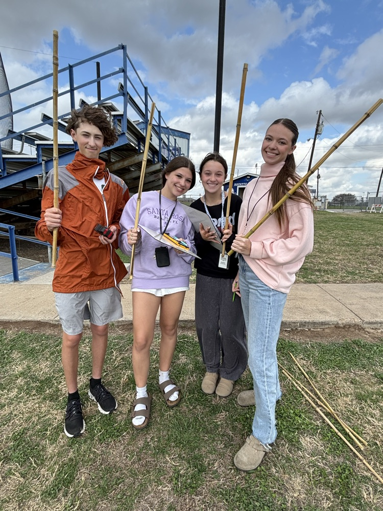 Coach Snow's geometry class used similar triangles to indirectly measure the baseball bleachers.