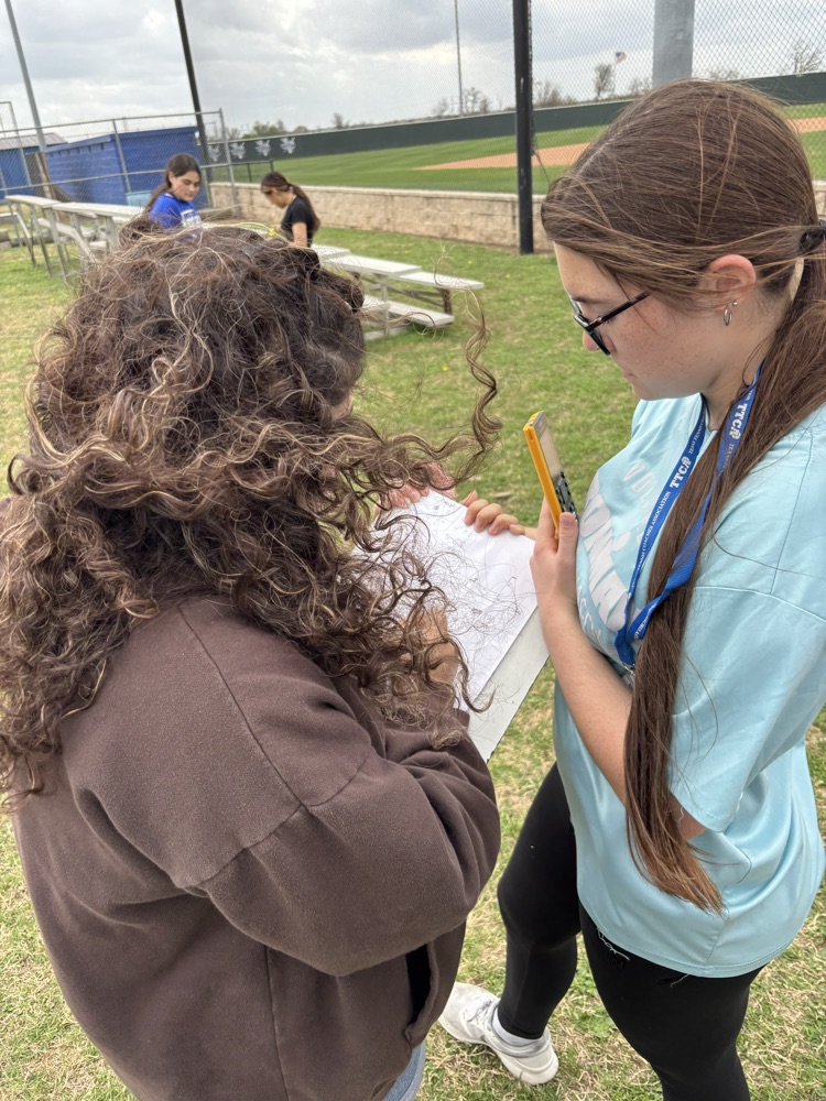 Coach Snow's geometry class used similar triangles to indirectly measure the baseball bleachers.