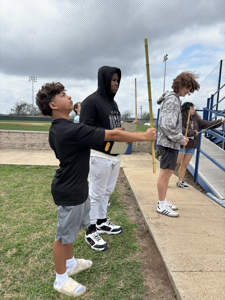 Coach Snow's geometry class used similar triangles to indirectly measure the baseball bleachers.