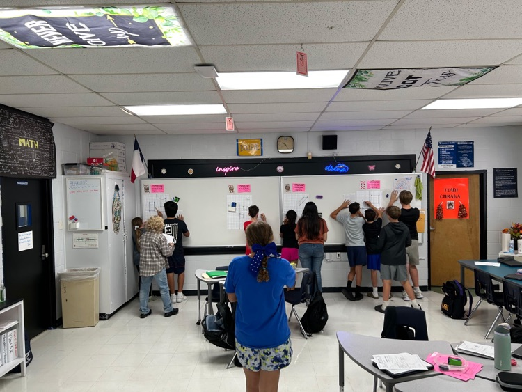 students at whiteboards