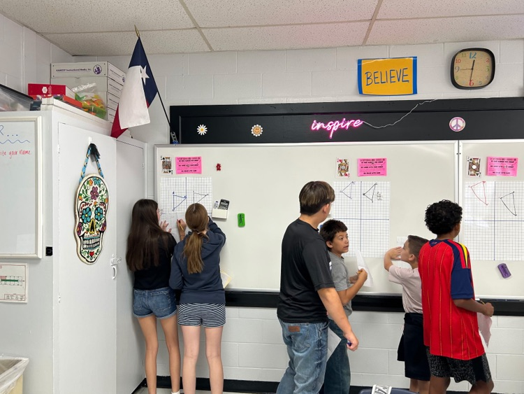 students at whiteboards