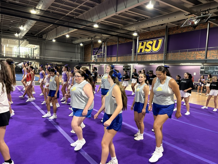 having fun at camp with all the other cheerleaders