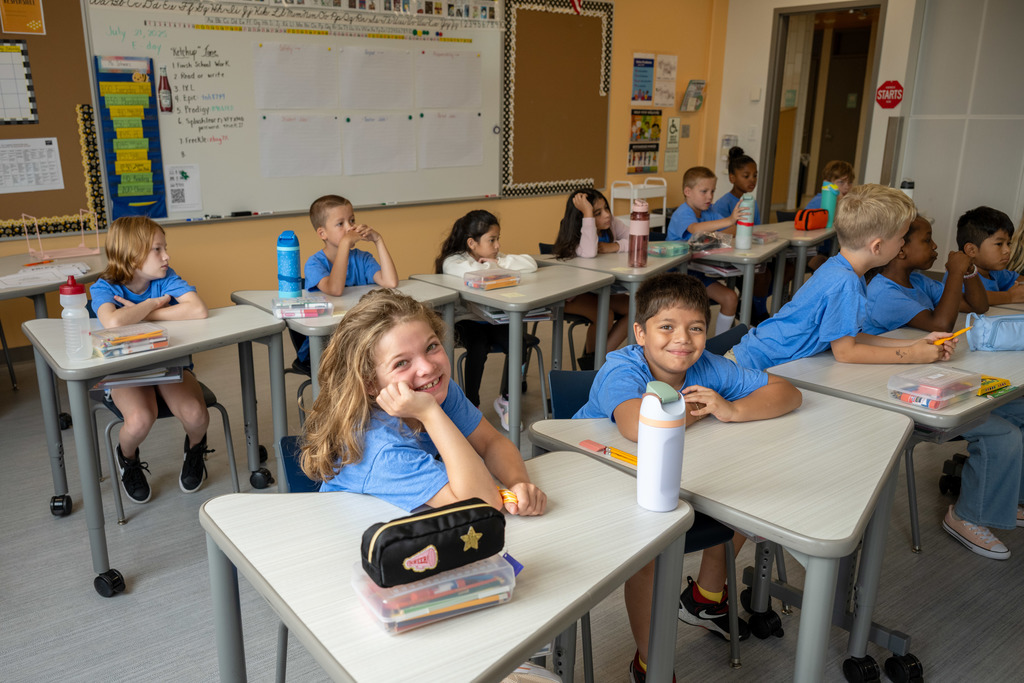 Students smiling at the camera