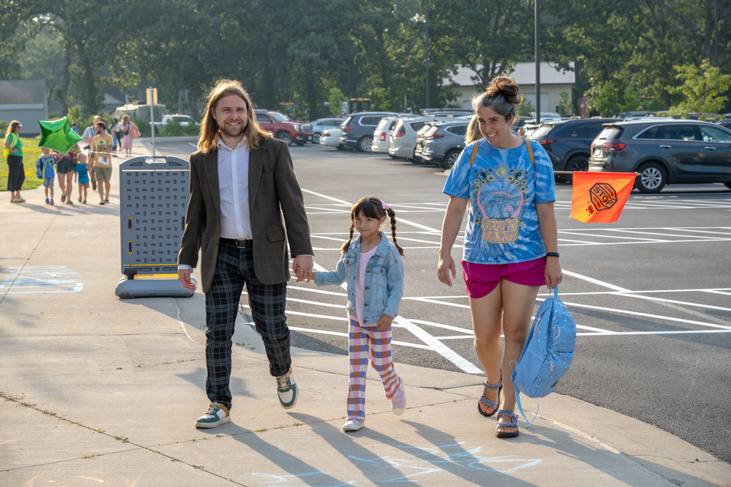 Family walking into school