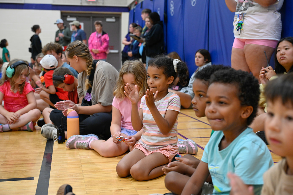 Girl clapping to song