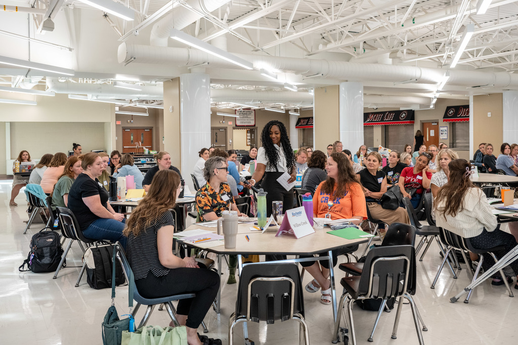 At new teacher orientation, the speakers asks an audience member about a time they felt included.