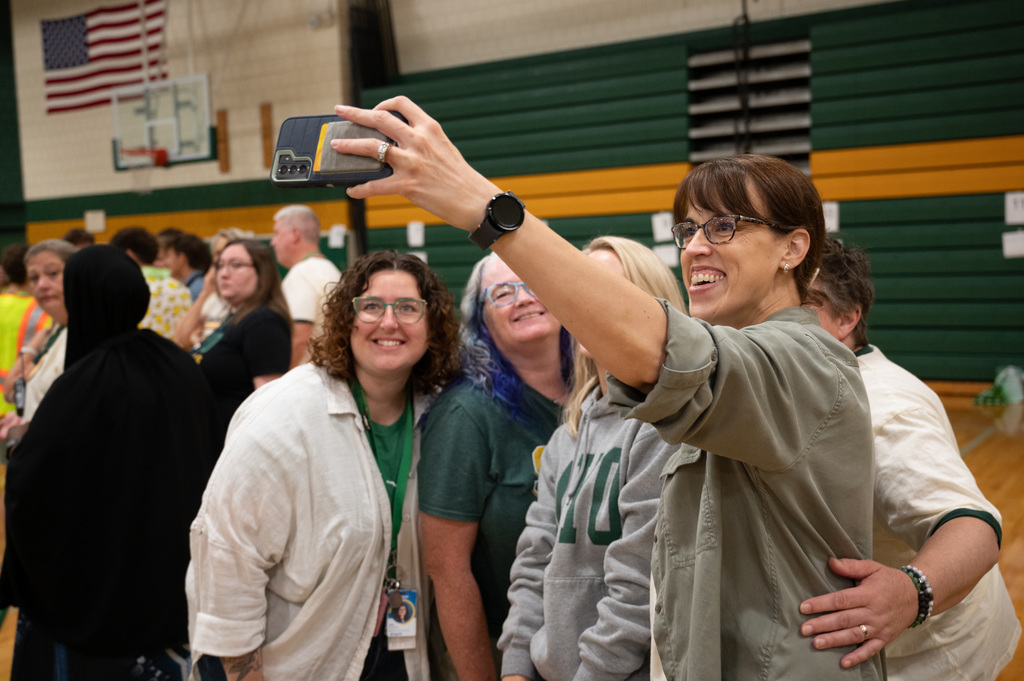Mayo High School teachers posing for a photo for the first day back at school for 6th grade students.