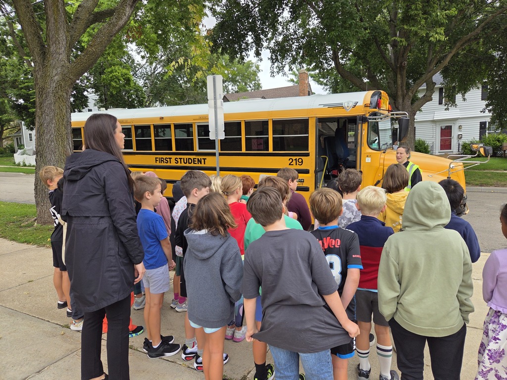 Mrs. Howes's 3rd graders practicing bus safety