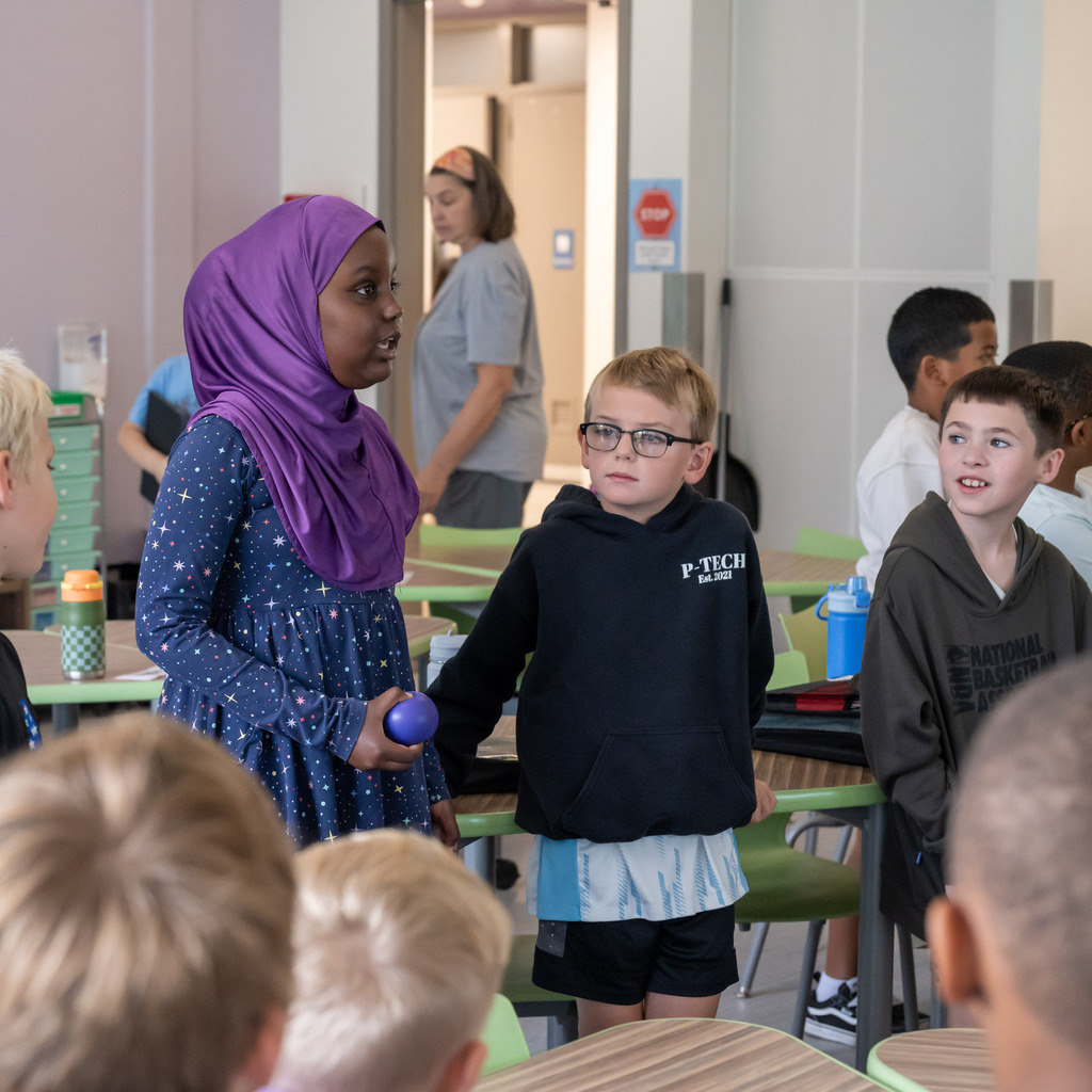 Overland Elementary student shares about what makes her laugh to her classmates during a morning community circle.