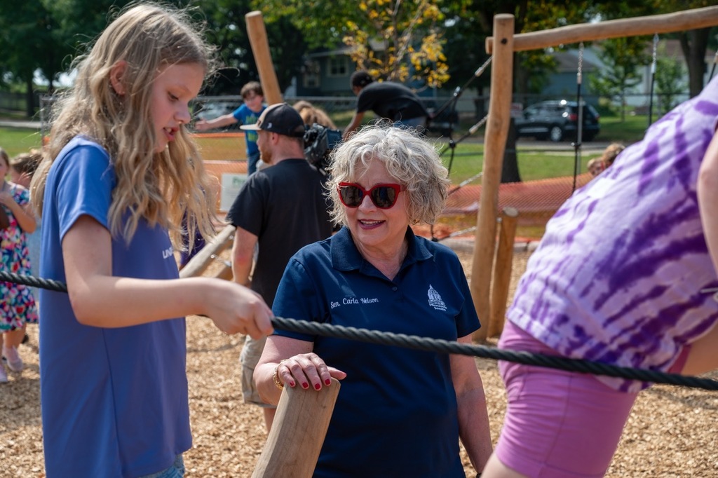 MN state senator Carla Nelson talks with a Franklin student