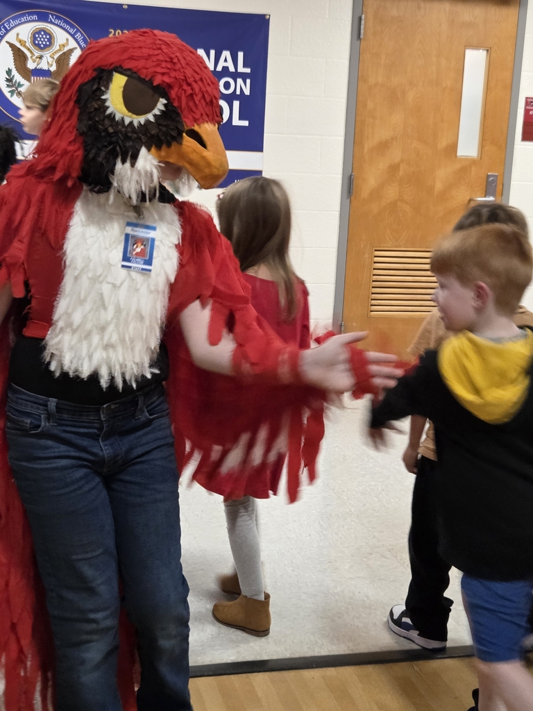 Our Falcon greeting kids at our Sept assembly
