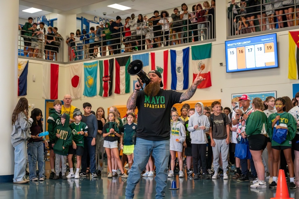 Willow Creek's EBD,  Mr. Hartman hypes up students before their assembly