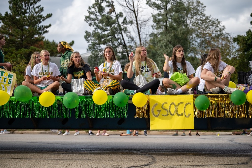 Mayo Girls Soccer throws candy to some spectators