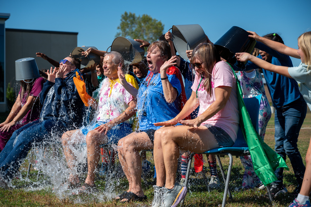 Longfellow teachers get ice water poured on them to help raise money for the Alzheimer's Association