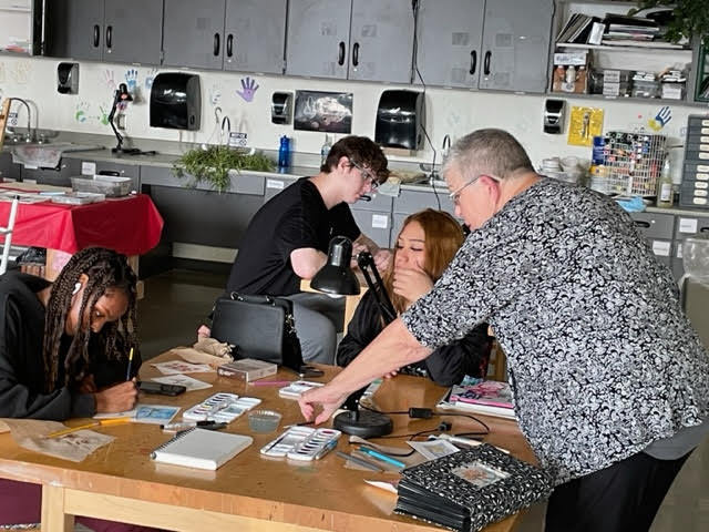 Guest water color artist at the ALC working with students