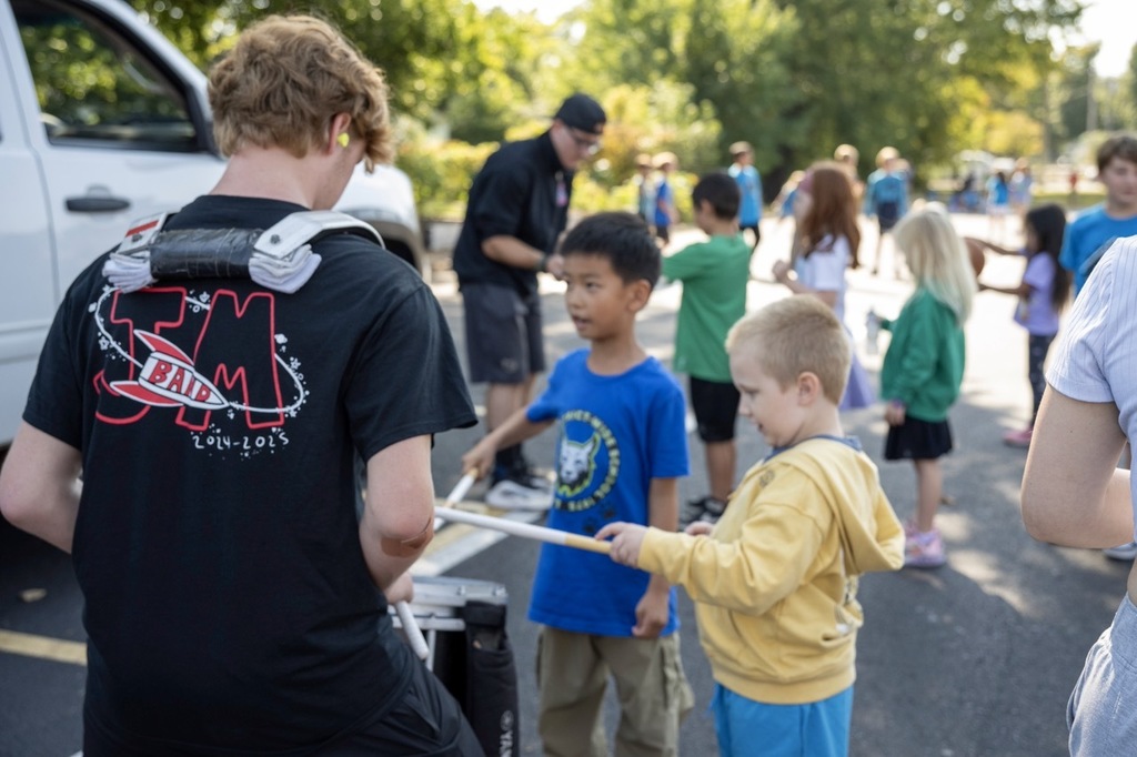 Lincoln students learning how to play the drum