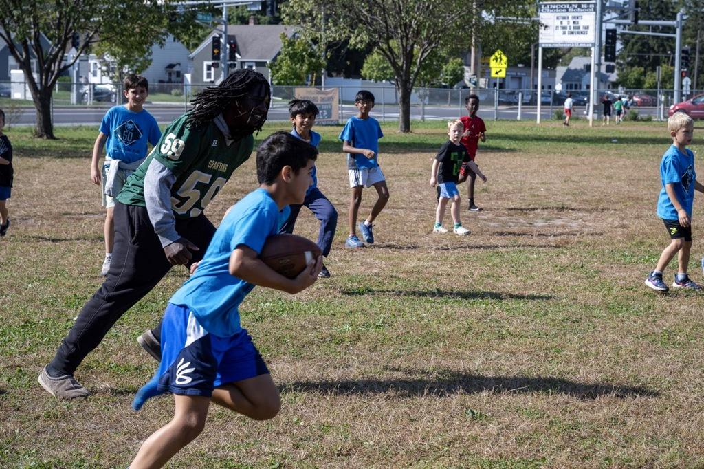 Lincoln plays football with Mayo football team