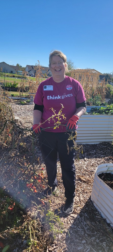 Think Bank volunteers at ALC community garden